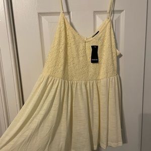 Flowy lace babydoll top, light yellow/cream colored . NWT, size 1